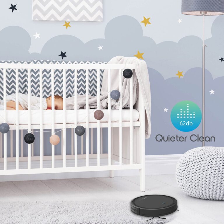 A baby sleeping soundly in his crib as the vacuum quickly and quietly cleans the nursery.