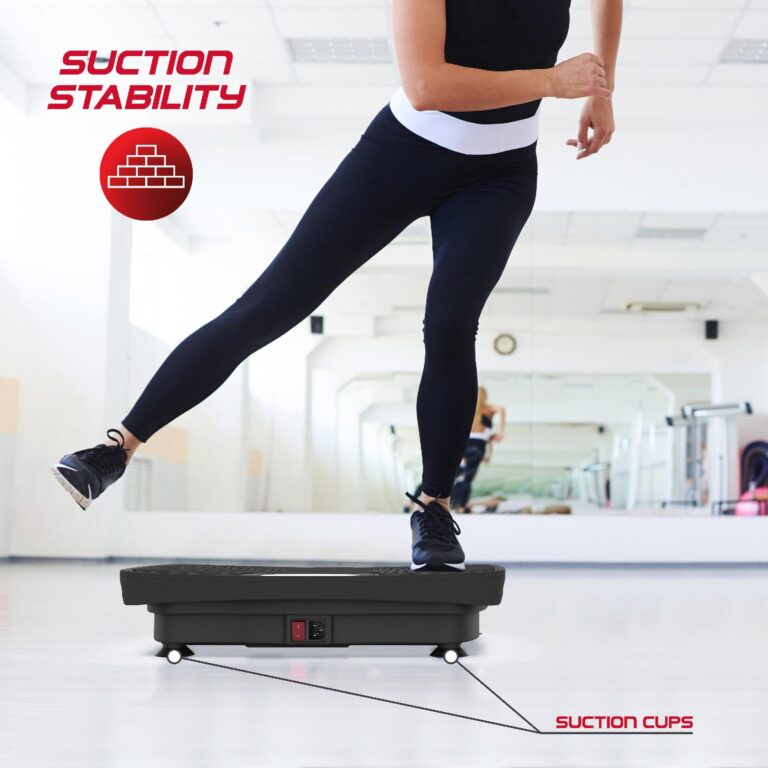 A woman doing an exercise on the board at the gym, while powerful suction cups keep it stable for a more secure workout.