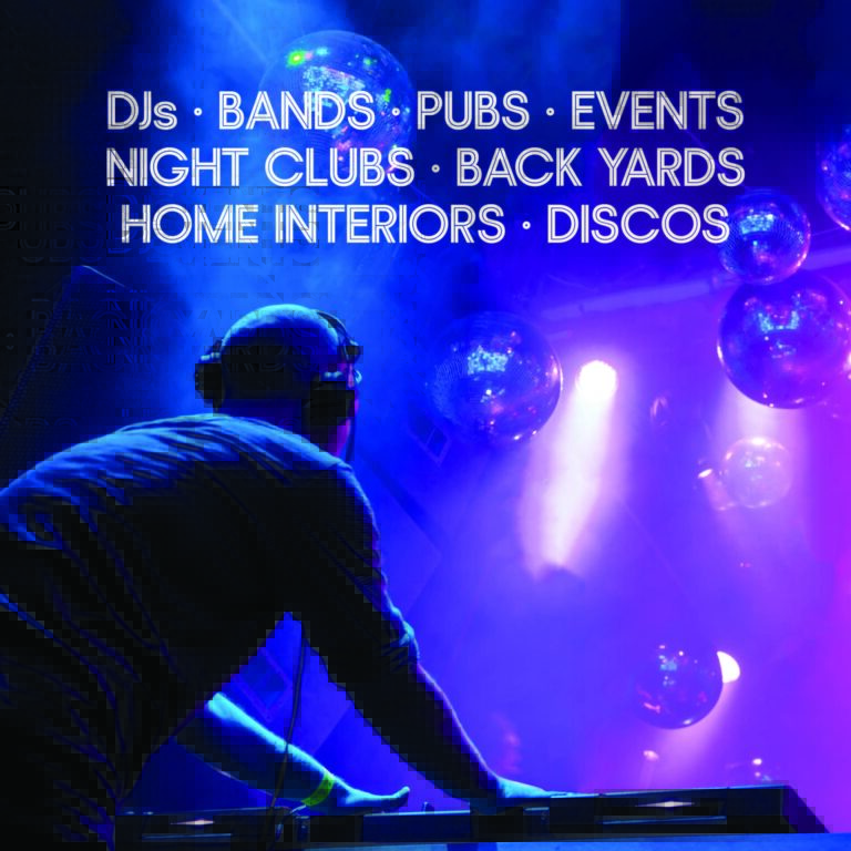 A DJ at a nightclub playing music as several Glam Nation Disco Balls light up the space for added fun.