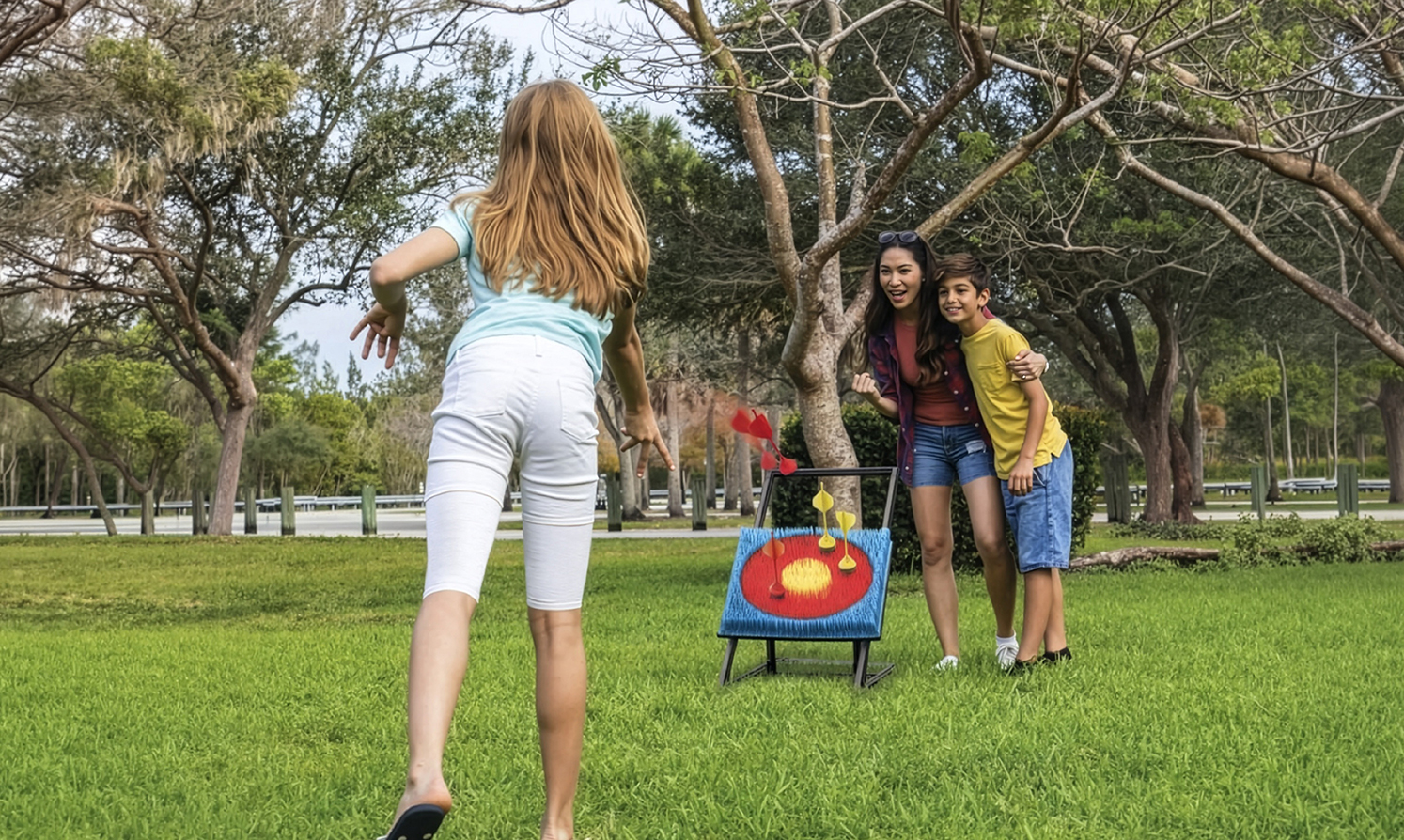 A person performing an incline bench press using a multifunctional workout bench setup